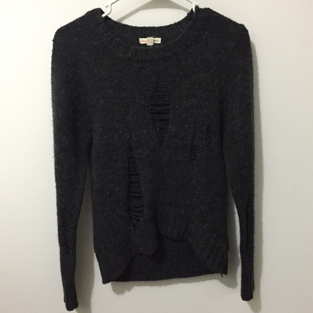 Distressed ripped sweater